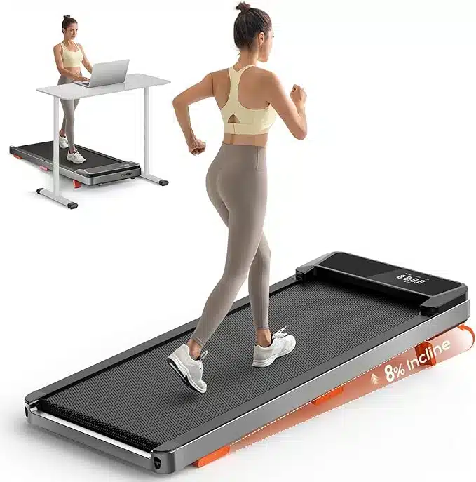 Woman running on Treaflow walking pad treadmill with 8% incline, remote control, and under-desk setup